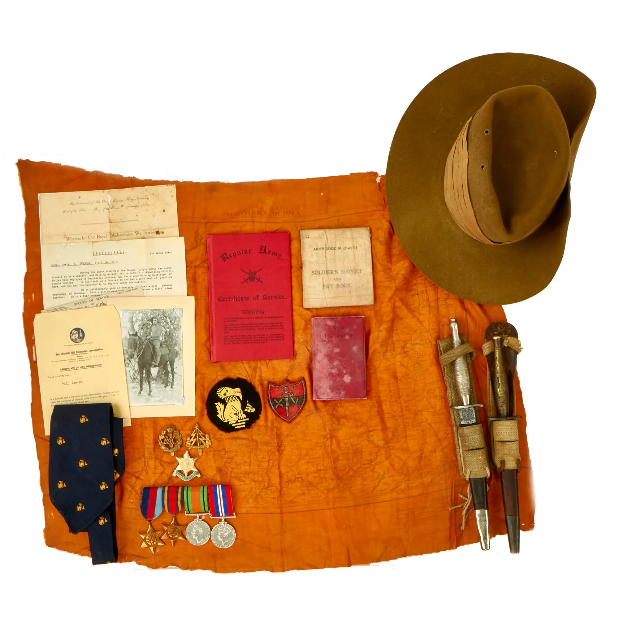 Original WWII British Chindit Long Range Penetration Group Grouping Attributed to L/Cpl Herbert Lowis with 1st & 2nd Pattern Fairbairn-Sykes Knives, Slouch Hat, Paperwork, Rare Burma Escape Map, Insignia